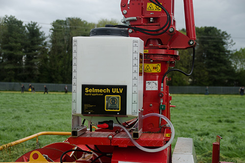 ultra low volume additive applicator mounted on a trailed forage harvester