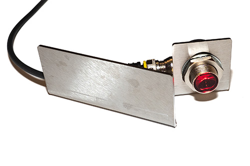 Silage additive applicator on a small inline baler