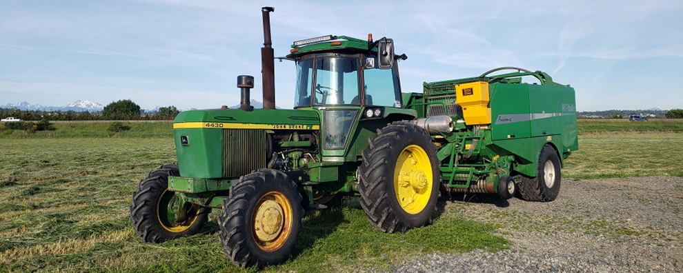 Powdermaster granular applicator mounted on a baler