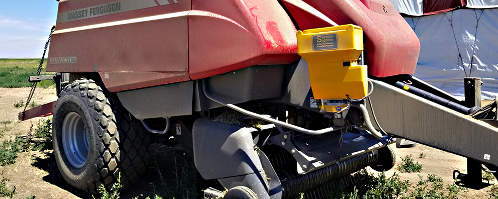 Dflow digitally controlled Powdermaster on a baler